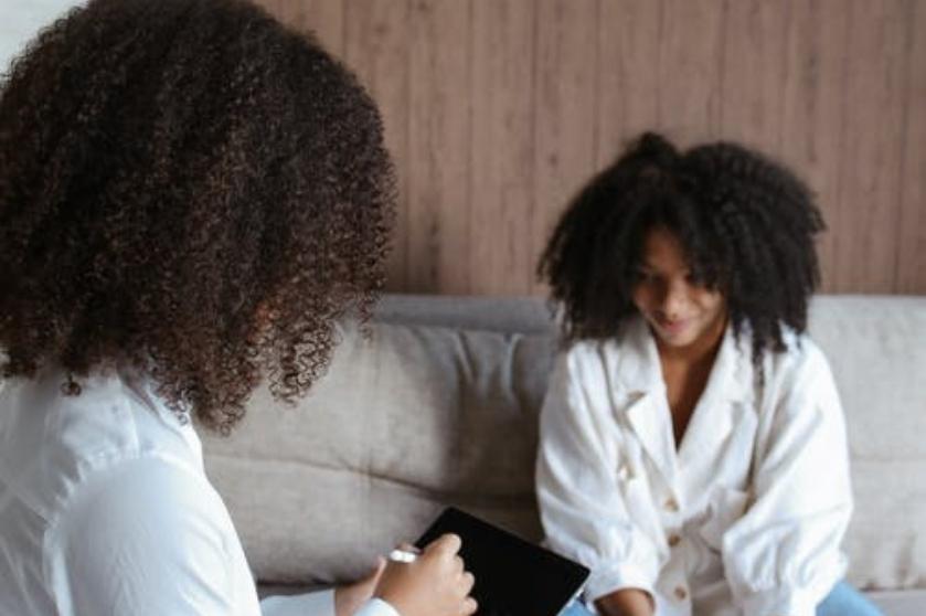 woman talking to teen