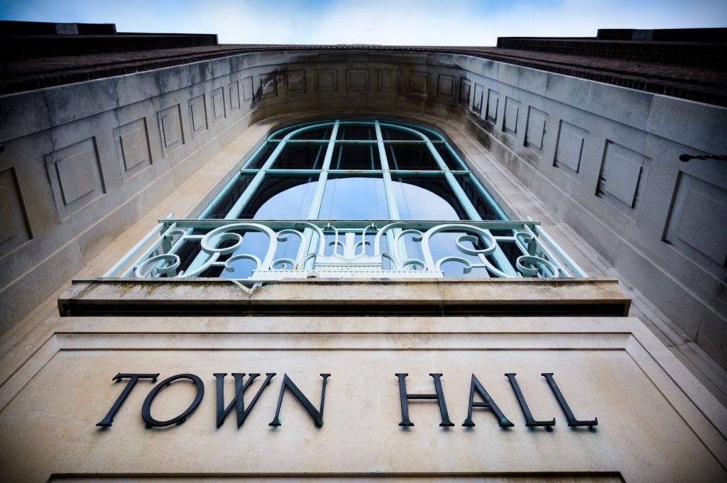 Photo of a town hall entrance.