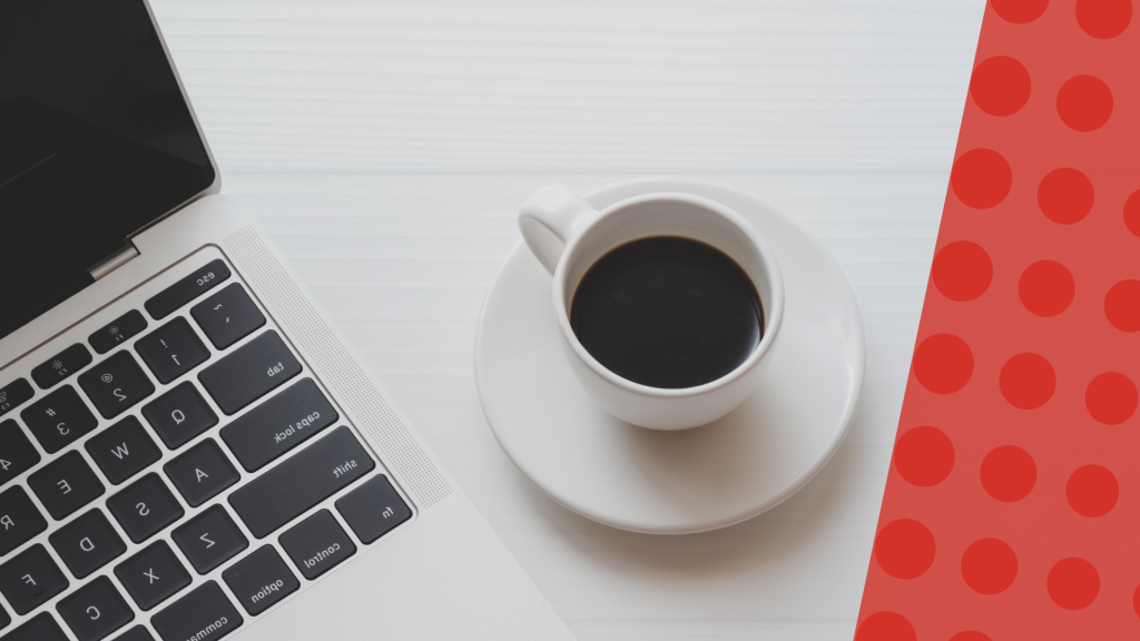 Laptop and coffee on desk with graphic frame.